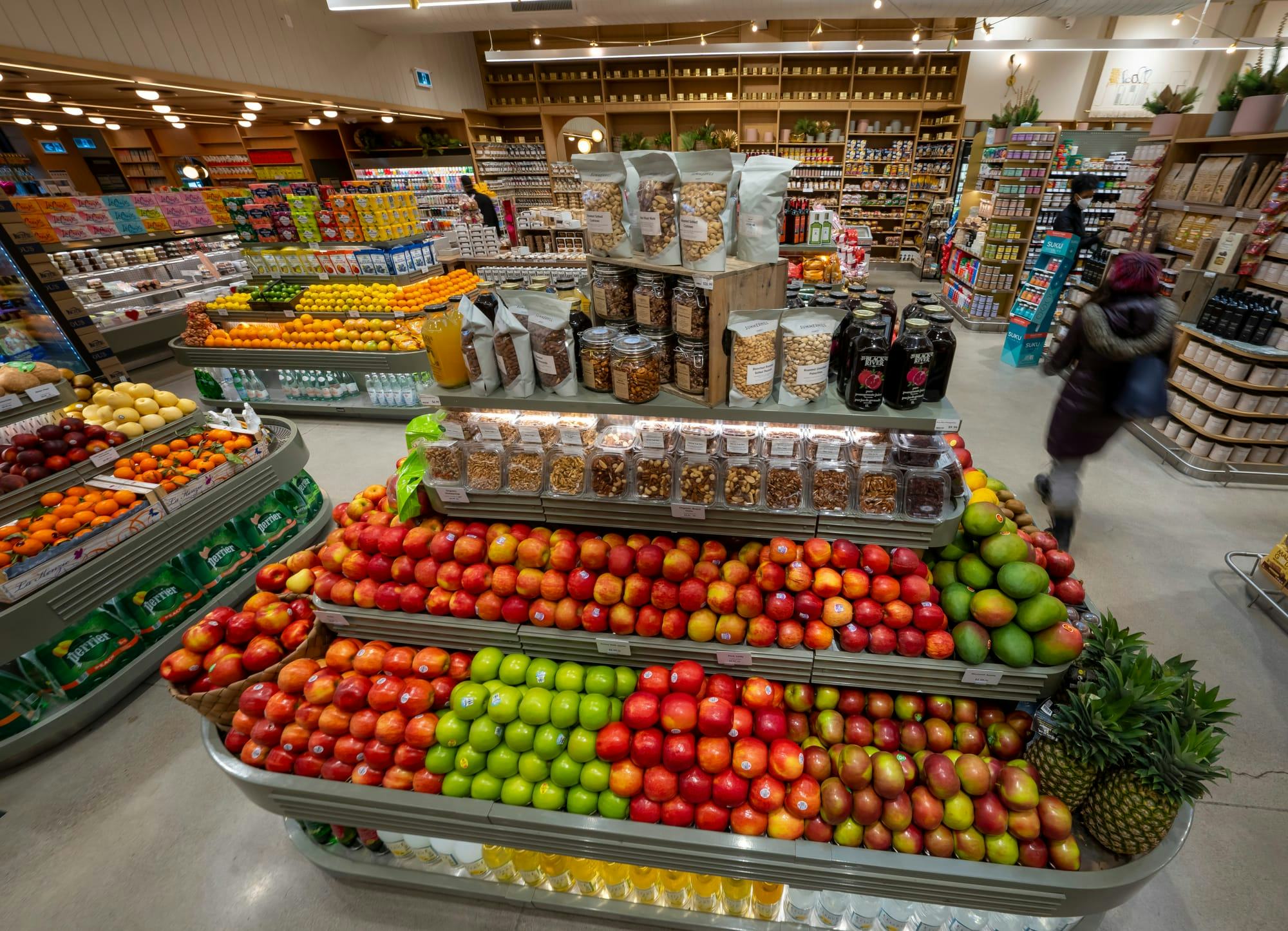  A fruit stand is seen in a grocery store